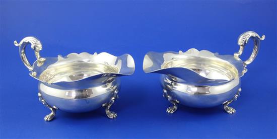 A pair of George V silver sauceboats by Goldsmiths & Silversmiths Co Ltd, 15 oz.